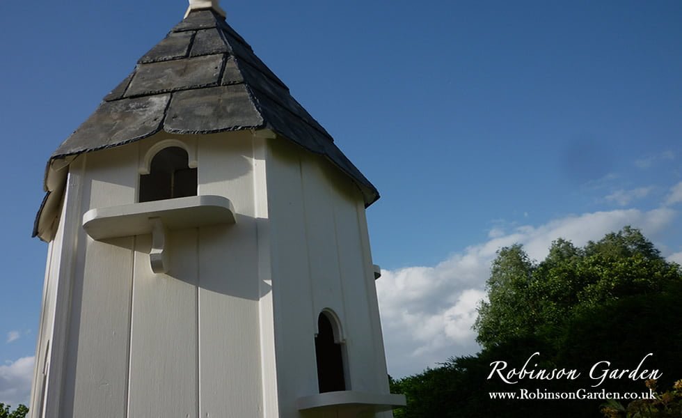 The Robinson Garden catalogue, displaying all of our bespoke garden products such as the Richmond seated arbour, dovecotes, bird tables, bird boxes, bird houses, wooden garden obelisks and more. Take a look at our catalogue on our website. Robinson Garden, bespoke garden products.